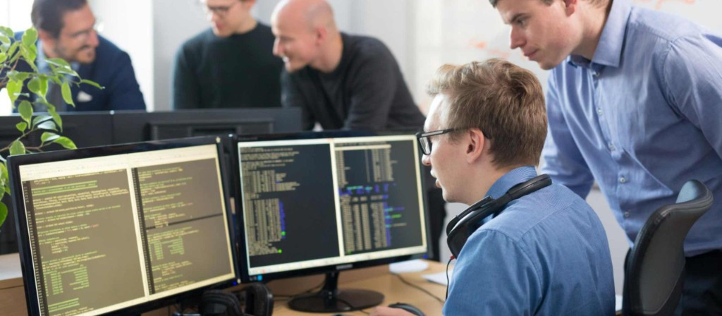 IT field team software engineers working together
