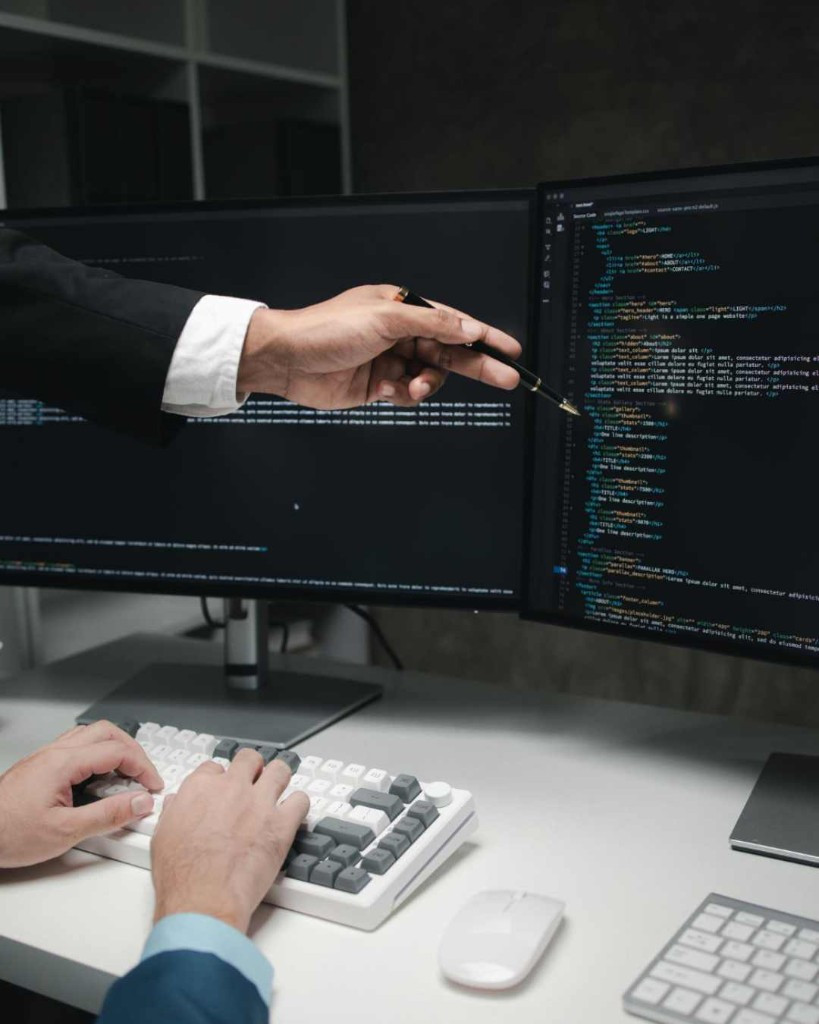 Custom software development on a dual-monitor workstation